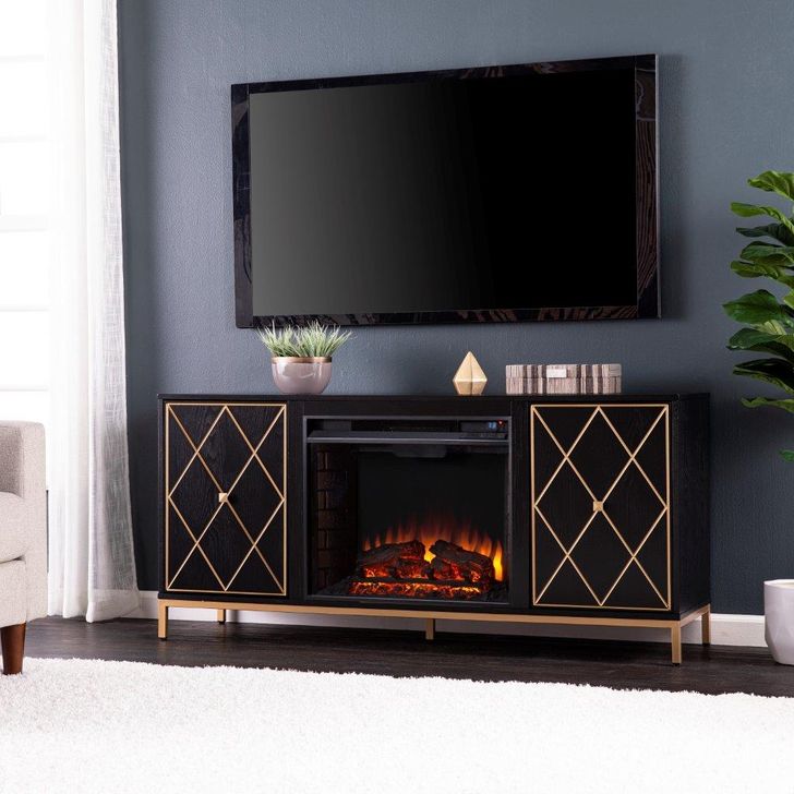 The appearance of Marradi Electric Fireplace With Media Storage designed by SEI Furniture in the modern / contemporary interior design. This gold piece of furniture  was selected by 1StopBedrooms from Marradi Collection to add a touch of cosiness and style into your home. Sku: FE1111956. Material: Wood. Product Type: Fireplace. Image1