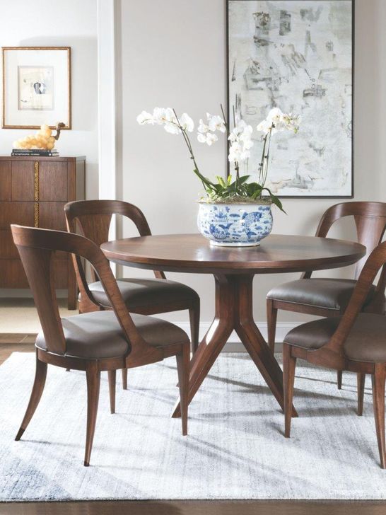 The appearance of Merville Brown Dining Set designed by Luxe Linea in the transitional interior design. This brown piece of furniture  was selected by 1StopBedrooms from Merville Collection to add a touch of cosiness and style into your home. Sku: 01-2104-870C;01-2104-880-01. Table Base Style: Pedestal. Table Top Shape: Round. Product Type: Dining Room Set. Size: 50". Image1