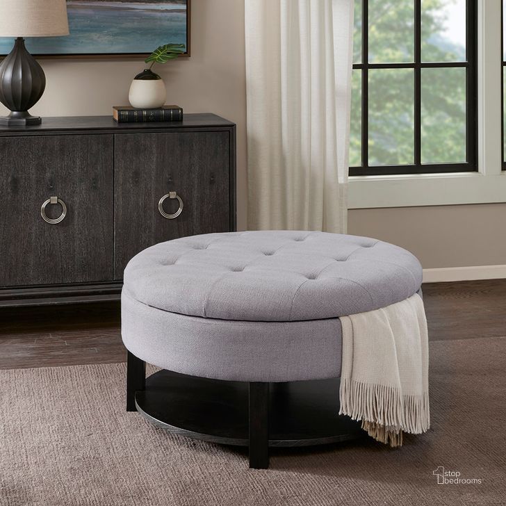 The appearance of Miller Round Storage Ottoman In Light Grey designed by Olliix in the transitional interior design. This light grey piece of furniture  was selected by 1StopBedrooms from Miller Collection to add a touch of cosiness and style into your home. Sku: MP101-1045. Material: Wood. Product Type: Ottoman. Image1