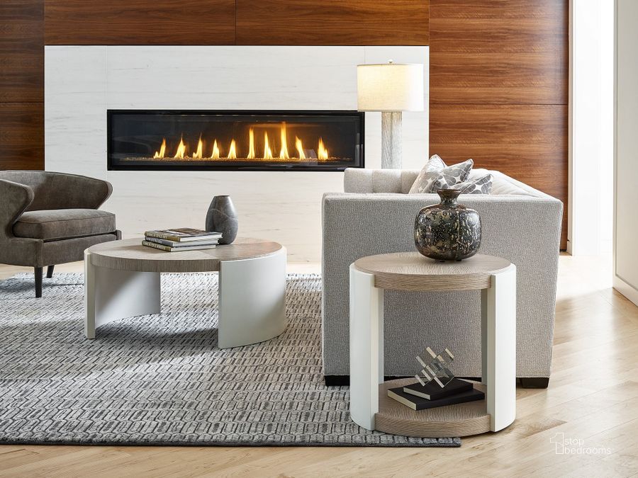 The appearance of Modern Pumice Round End Table designed by Universal in the transitional interior design. This white piece of furniture  was selected by 1StopBedrooms from Modern Collection to add a touch of cosiness and style into your home. Sku: 964815. Product Type: End Table. Image1