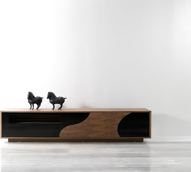 The appearance of Modern TV Base 101F designed by J&M in the modern / contemporary interior design. This walnut and black piece of furniture  was selected by 1StopBedrooms from Modern Collection to add a touch of cosiness and style into your home. Sku: 17945. Product Type: TV Stand.