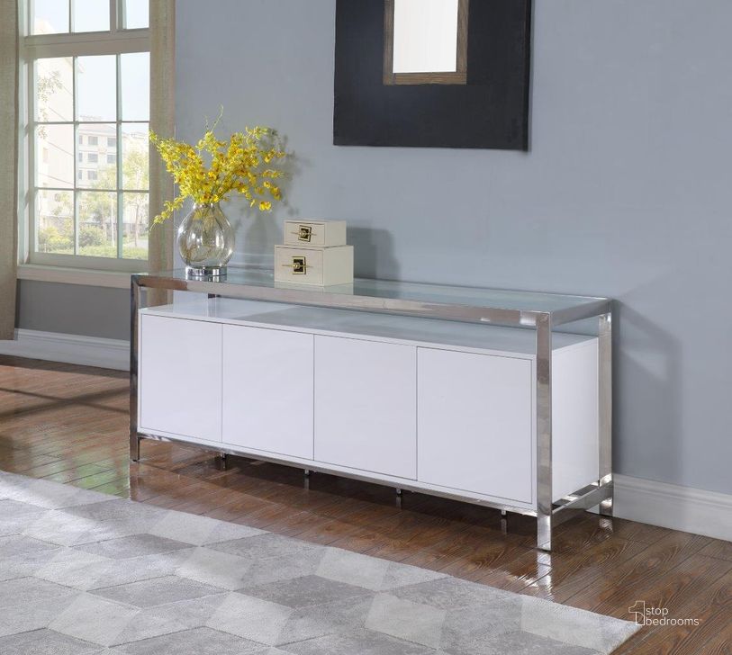 The appearance of Modern White Buffet with Stainless Steel and Tempered Glass Top designed by Chintaly Imports in the modern / contemporary interior design. This gloss white piece of furniture  was selected by 1StopBedrooms from  to add a touch of cosiness and style into your home. Sku: KRISTA-BUF. Product Type: Buffet. Material: Stainless Steel. Image1