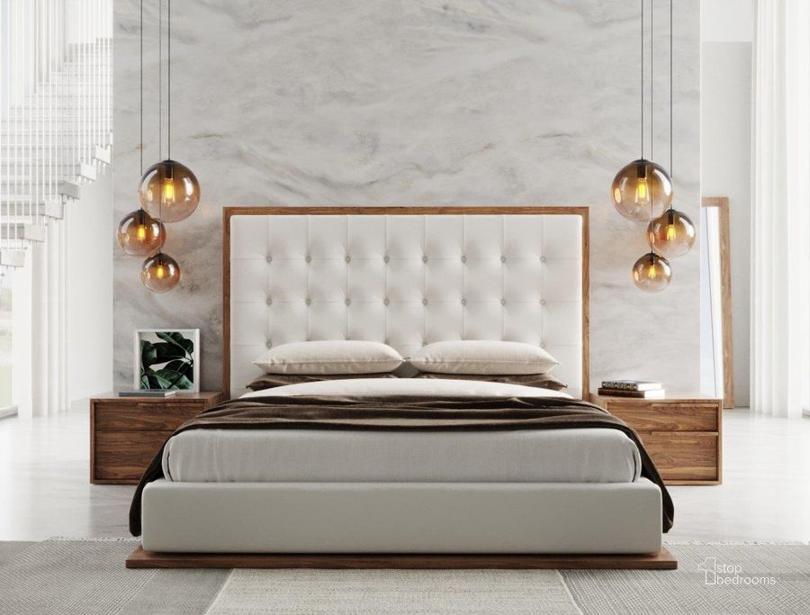 The appearance of Modrest Amberlie Eastern King White Vegan Leather And Walnut Bed designed by VIG Furniture in the modern / contemporary interior design. This white piece of furniture  was selected by 1StopBedrooms from Modrest Amberlie Collection to add a touch of cosiness and style into your home. Sku: VGMABR-96-WAL-BED-EK. Bed Type: Platform Bed. Material: Leather. Product Type: Platform Bed. Bed Size: King. Image1