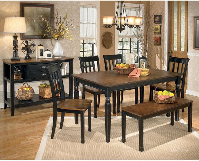 The appearance of Moller Black Casual Dining Set designed by Bennett Interiors in the traditional interior design. This black/brown piece of furniture  was selected by 1StopBedrooms from Moller Collection to add a touch of cosiness and style into your home. Sku: D580-02;D580-25. Table Base Style: Legs. Material: Wood. Product Type: Casual Dining Set. Table Top Shape: Rectangular. Table Top Style: Leg. Size: 36". Image1