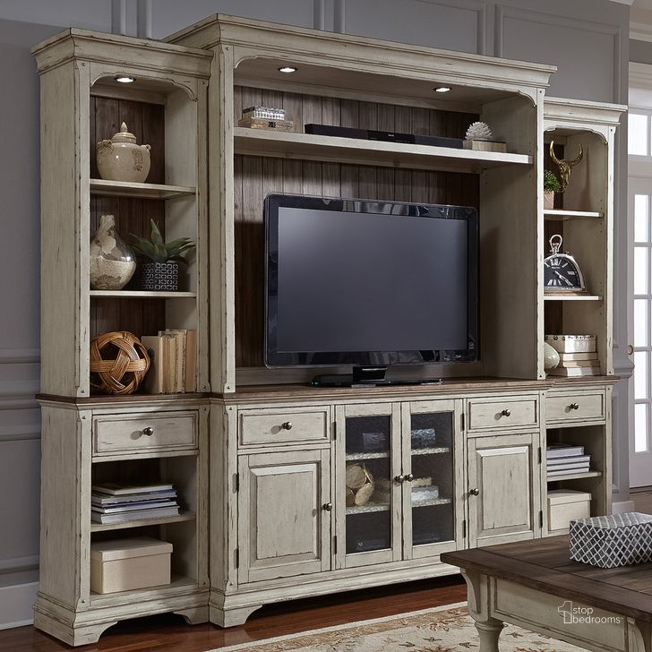 The appearance of Morgan Creek Entertainment Wall designed by Liberty in the traditional interior design. This cream piece of furniture  was selected by 1StopBedrooms from Morgan Creek Collection to add a touch of cosiness and style into your home. Sku: 498-EC69;498-EL00B;498-EL00T;498-ER00B;498-ER00T;498-TV68. Material: Wood. Product Type: Entertainment Wall. Image1