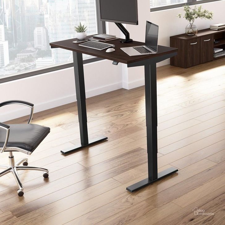 The appearance of Move 40 Series by Bush Business Furniture 48W x 24D Electric Height Adjustable Standing Desk in Black Walnut with Black Base designed by Bush Furniture in the modern / contemporary interior design. This black walnut piece of furniture  was selected by 1StopBedrooms from Move 40 Series Collection to add a touch of cosiness and style into your home. Sku: M4S4824BWBK. Product Type: Desk. Image1