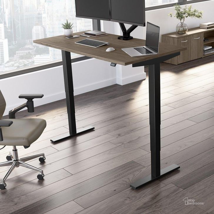 The appearance of Move 40 Series by Bush Business Furniture 60W x 30D Electric Height Adjustable Standing Desk in Modern Hickory with Black Base designed by Bush Furniture in the transitional interior design. This modern hickory piece of furniture  was selected by 1StopBedrooms from Move 40 Series Collection to add a touch of cosiness and style into your home. Sku: M4S6030MHBK. Product Type: Desk. Image1