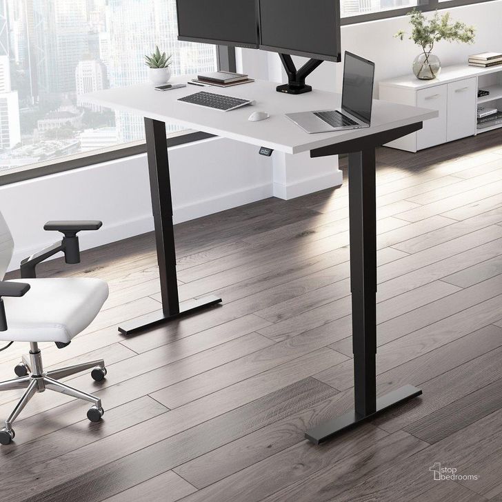 The appearance of Move 40 Series by Bush Business Furniture 60W x 30D Electric Height Adjustable Standing Desk in White with Black Base designed by Bush Furniture in the modern / contemporary interior design. This white piece of furniture  was selected by 1StopBedrooms from Move 40 Series Collection to add a touch of cosiness and style into your home. Sku: M4S6030WHBK. Product Type: Desk. Image1