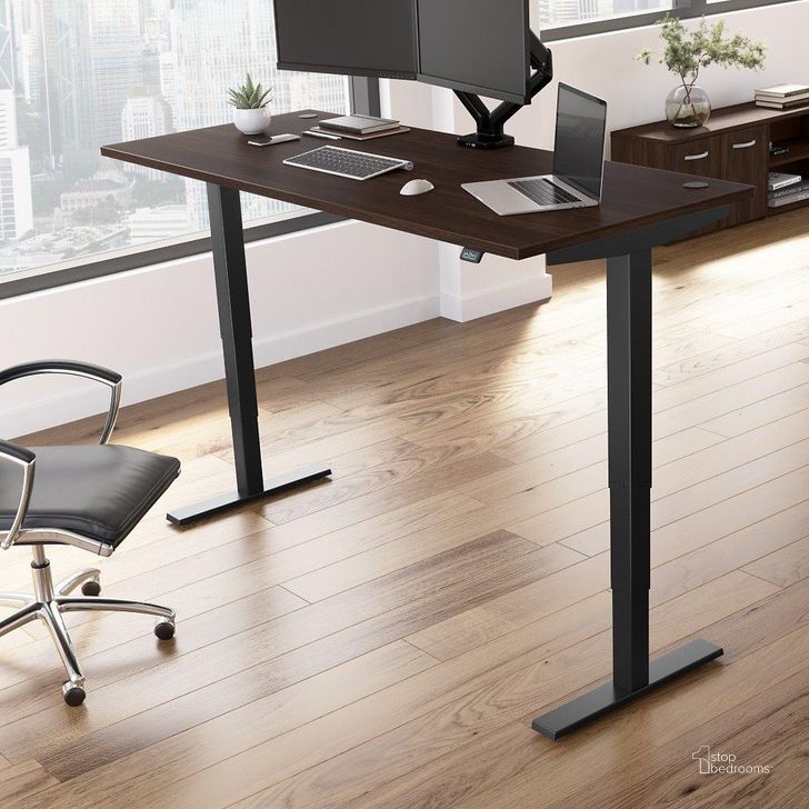 The appearance of Move 40 Series by Bush Business Furniture 72W x 30D Electric Height Adjustable Standing Desk in Black Walnut with Black Base designed by Bush Furniture in the transitional interior design. This black walnut piece of furniture  was selected by 1StopBedrooms from Move 40 Series Collection to add a touch of cosiness and style into your home. Sku: M4S7230BWBK. Product Type: Desk. Image1
