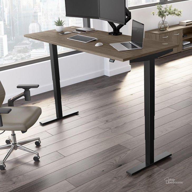The appearance of Move 40 Series by Bush Business Furniture 72W x 30D Electric Height Adjustable Standing Desk in Modern Hickory with Black Base designed by Bush Furniture in the modern / contemporary interior design. This modern hickory piece of furniture  was selected by 1StopBedrooms from Move 40 Series Collection to add a touch of cosiness and style into your home. Sku: M4S7230MHBK. Product Type: Desk. Image1