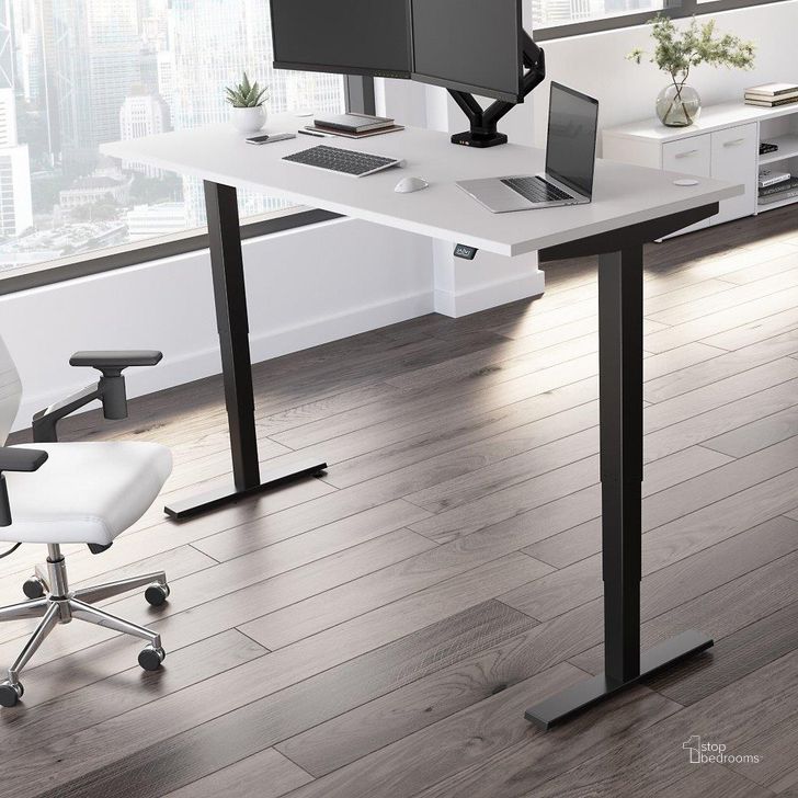 The appearance of Move 40 Series by Bush Business Furniture 72W x 30D Electric Height Adjustable Standing Desk in White with Black Base designed by Bush Furniture in the modern / contemporary interior design. This white piece of furniture  was selected by 1StopBedrooms from Move 40 Series Collection to add a touch of cosiness and style into your home. Sku: M4S7230WHBK. Product Type: Desk. Image1
