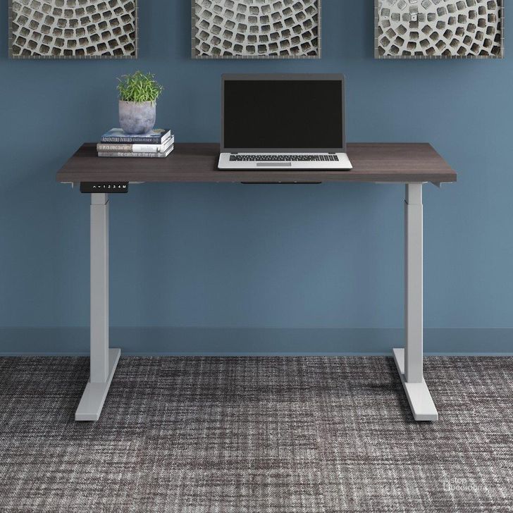 The appearance of Move 60 Series by Bush Business Furniture 48W x 24D Height Adjustable Standing Desk in Storm Gray with Cool Gray Metallic Base designed by Bush Furniture in the modern / contemporary interior design. This storm gray piece of furniture  was selected by 1StopBedrooms from Move 60 Series Collection to add a touch of cosiness and style into your home. Sku: M6S4824SGSK. Product Type: Desk. Image1