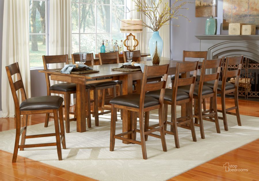 The appearance of Mariposa 100" Rustic Whiskey Extendable Counter Height Leg Dining Room Set designed by A-America in the transitional interior design. This whiskey piece of furniture  was selected by 1StopBedrooms from Mariposa Collection to add a touch of cosiness and style into your home. Sku: MRPRW6701;MRPRW3552. Table Base Style: Trestle. Product Type: Dining Room Set. Table Top Shape: Rectangular. Material: Rubberwood. Image1