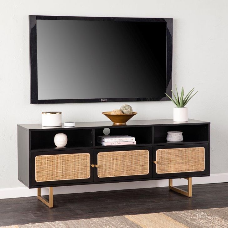 The appearance of Mursley Media Cabinet With Storage In Black designed by SEI Furniture in the transitional interior design. This black piece of furniture  was selected by 1StopBedrooms from Mursley Collection to add a touch of cosiness and style into your home. Sku: MS1222613. Material: Wood. Product Type: Media Console. Image1