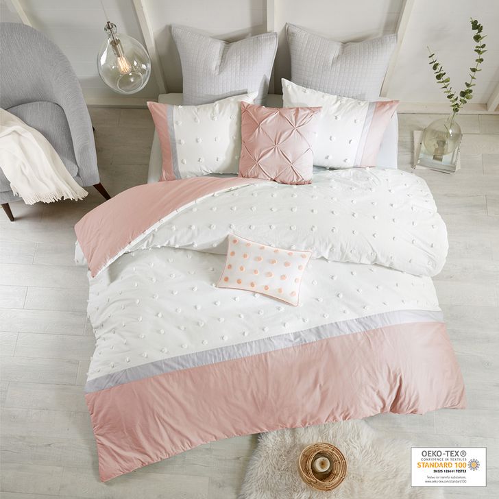 The appearance of Myla Cotton Jacquard 7Pcs King Comforter Set With Woven Cotton Dots In Blush designed by Olliix in the modern / contemporary interior design. This blush piece of furniture  was selected by 1StopBedrooms from Myla Collection to add a touch of cosiness and style into your home. Sku: UH10-2150. Material: Polyester. Bed Size: King. Product Type: Comforter Set. Image1
