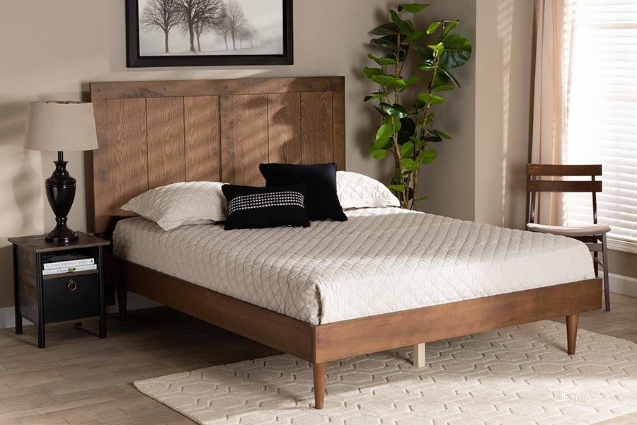The appearance of Nicola Mid-Century Modern Transitional Ash Walnut Finished Wood Queen Size Platform Bed designed by Baxton Studio in the transitional interior design. This ash walnut piece of furniture  was selected by 1StopBedrooms from Nicola Collection to add a touch of cosiness and style into your home. Sku: Nicola-Ash Walnut-Queen. Bed Type: Platform Bed. Product Type: Platform Bed. Bed Size: Queen. Material: Rubberwood. Image1