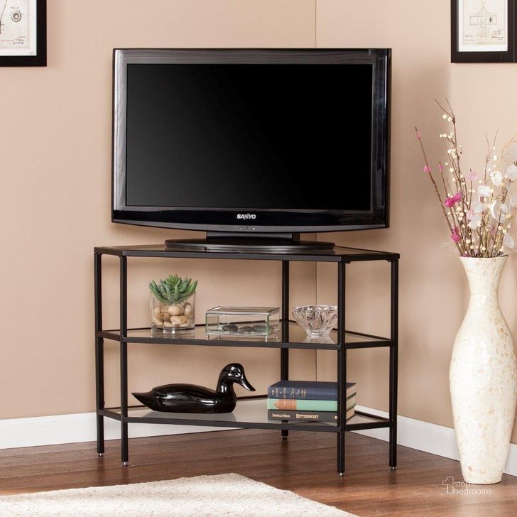 The appearance of Niles Metal-Glass Corner Tv Stand In Black designed by SEI Furniture in the modern / contemporary interior design. This black piece of furniture  was selected by 1StopBedrooms from Niles Collection to add a touch of cosiness and style into your home. Sku: MS2411. Product Type: TV Stand. Material: Iron. Image1