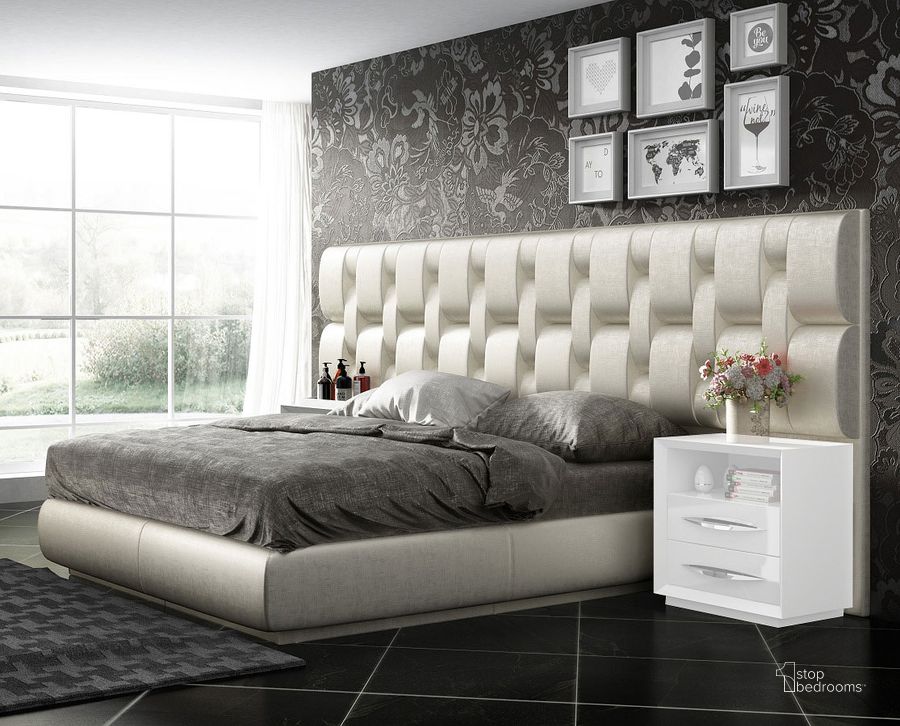 The appearance of Nissman White King Upholstered Bed 0qd2358865 designed by Luxury Loft in the modern / contemporary interior design. This white piece of furniture  was selected by 1StopBedrooms from Nissman Collection to add a touch of cosiness and style into your home. Sku: EMPORIOBEDKS;WFRAMEKINGS. Bed Type: Platform Bed. Product Type: Platform Bed. Bed Size: King.