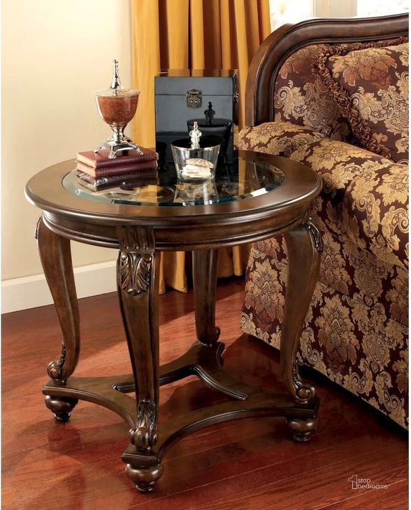 The appearance of Norcastle End Table designed by Signature Design by Ashley in the traditional interior design. This dark brown piece of furniture  was selected by 1StopBedrooms from Norcastle Collection to add a touch of cosiness and style into your home. Sku: T499-6. Table Top Shape: Oval. Material: Glass. Product Type: End Table. Image1