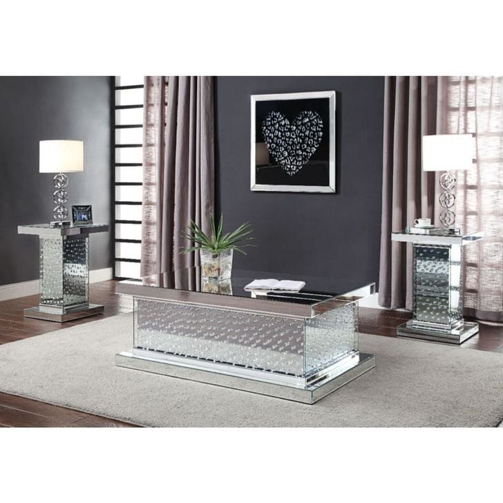 The appearance of Nysa Mirrored Rectangular Coffee Table designed by ACME in the glam interior design. This medium color piece of furniture  was selected by 1StopBedrooms from Nysa Collection to add a touch of cosiness and style into your home. Sku: 81410. Material: MDF. Product Type: Coffee and Cocktail Table. Image1