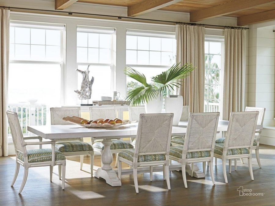 The appearance of Ocean Breeze Beige Captiva Rectangular Extendable Dining Room Set designed by Tommy Bahama in the transitional interior design. This beige piece of furniture  was selected by 1StopBedrooms from Ocean Breeze Collection to add a touch of cosiness and style into your home. Sku: 01-0570-877C;01-0570-880-01. Table Base Style: Double Pedestal. Material: Wood. Product Type: Dining Room Set. Table Top Shape: Rectangular. Size: 88". Image1