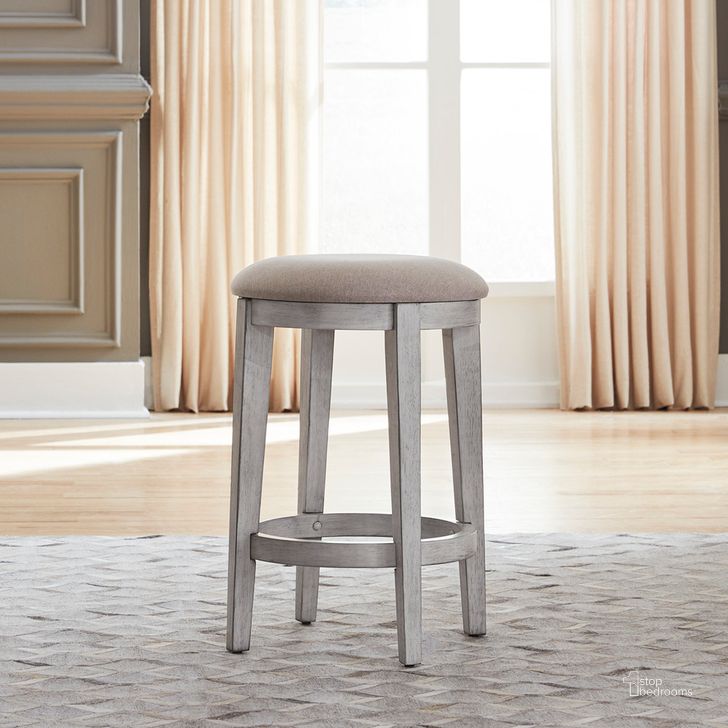 The appearance of Ocean Isle Upholstered Console Stool In Antique White With Weathered Pine designed by Liberty in the traditional interior design. This antique white piece of furniture  was selected by 1StopBedrooms from Ocean Isle Collection to add a touch of cosiness and style into your home. Sku: 303W-OT9001. Product Type: Barstool. Material: Rubberwood.