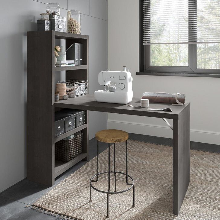 The appearance of Office by Kathy Ireland Echo 56W Craft Table in Charcoal Maple designed by Bush Furniture in the modern / contemporary interior design. This charcoal piece of furniture  was selected by 1StopBedrooms from Echo Collection to add a touch of cosiness and style into your home. Sku: ECH023CM. Material: Wood. Product Type: Table. Image1