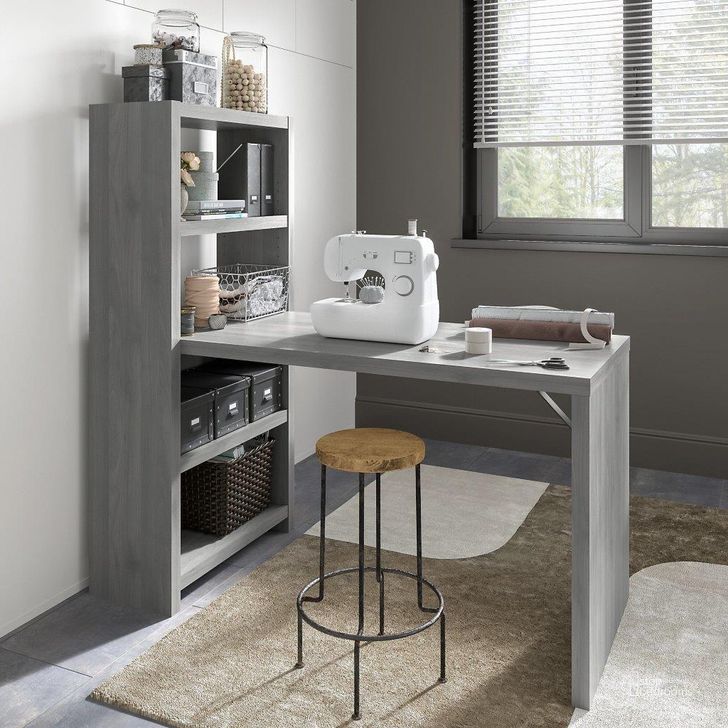 The appearance of Office by Kathy Ireland Echo 56W Craft Table in Modern Gray designed by Bush Furniture in the modern / contemporary interior design. This gray piece of furniture  was selected by 1StopBedrooms from Echo Collection to add a touch of cosiness and style into your home. Sku: ECH023MG. Material: Wood. Product Type: Table. Image1