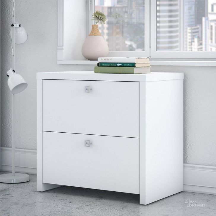 The appearance of Office by Kathy Ireland Echo Lateral File Cabinet in Pure White designed by Bush Furniture in the modern / contemporary interior design. This white piece of furniture  was selected by 1StopBedrooms from Echo Collection to add a touch of cosiness and style into your home. Sku: KI60102-03. Product Type: Lateral Filing Cabinet. Image1