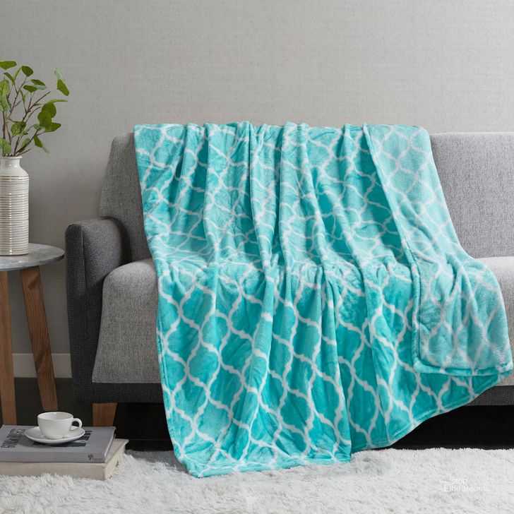 The appearance of Ogee Polyester Print Microlight Brushed Throw With 1 Inch Self Hem In Aqua designed by Olliix in the transitional interior design. This aqua piece of furniture  was selected by 1StopBedrooms from Ogee Collection to add a touch of cosiness and style into your home. Sku: MP50-1729. Material: Polyester. Product Type: Throw. Image1