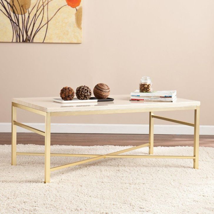 The appearance of Orinda Faux Stone Travertine Cocktail Table designed by SEI Furniture in the glam interior design. This brass piece of furniture  was selected by 1StopBedrooms from Orinda Collection to add a touch of cosiness and style into your home. Sku: CK3940. Product Type: Cocktail Table. Material: MDF. Image1