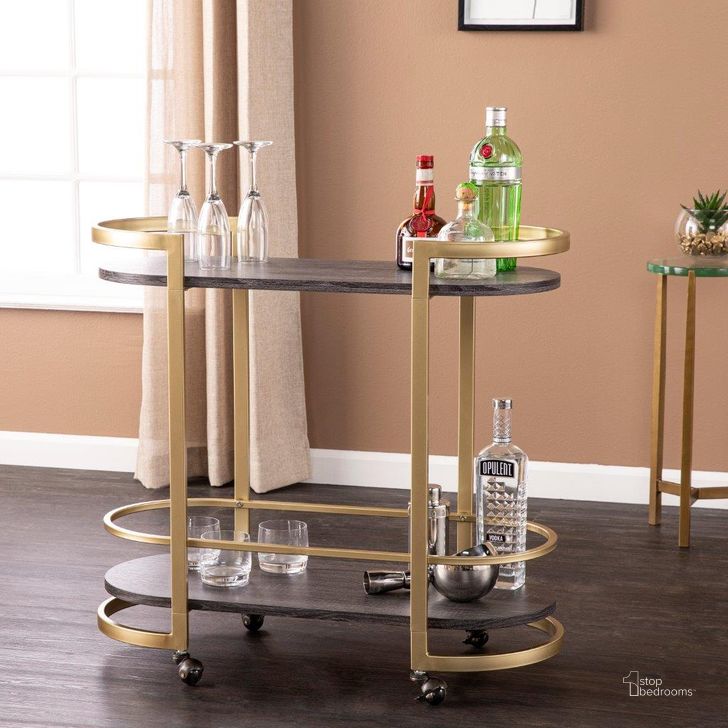 The appearance of Otsento Rolling Bar Cart designed by SEI Furniture in the modern / contemporary interior design. This ebony piece of furniture  was selected by 1StopBedrooms from Otsento Collection to add a touch of cosiness and style into your home. Sku: HZ1104340. Material: Wood. Product Type: Bar Cart. Image1