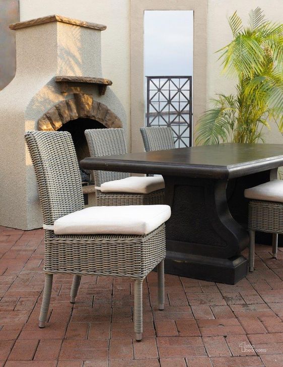The appearance of Outdoor Boca Grey Chair With White Outdoor Cushion designed by Padmas Plantation in the modern / contemporary interior design. This grey piece of furniture  was selected by 1StopBedrooms from Boca Collection to add a touch of cosiness and style into your home. Sku: OL-BOC12-ECO. Product Type: Outdoor Dining Chair. Material: Wicker. Image1