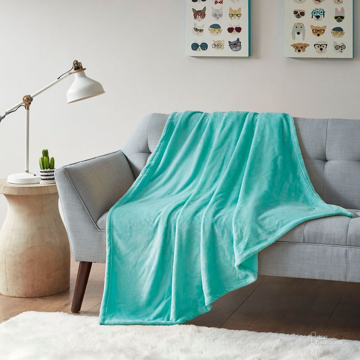 The appearance of Oversized Solid Microlight Plush Brushed Throw In Aqua designed by Olliix in the transitional interior design. This aqua piece of furniture  was selected by 1StopBedrooms from Microlight Plush Collection to add a touch of cosiness and style into your home. Sku: ID50-842. Material: Polyester. Product Type: Throw. Image1