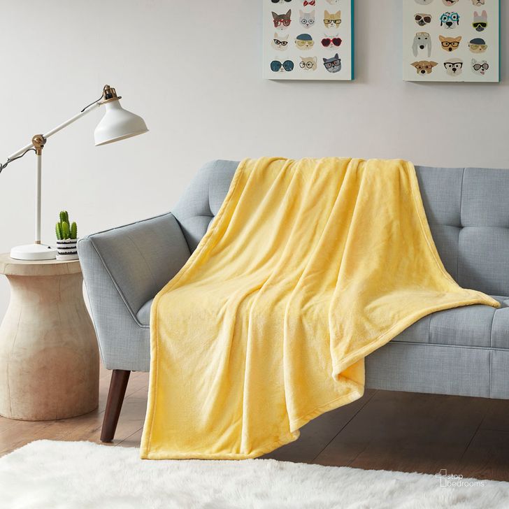 The appearance of Oversized Solid Microlight Plush Brushed Throw In Yellow designed by Olliix in the transitional interior design. This yellow piece of furniture  was selected by 1StopBedrooms from Microlight Plush Collection to add a touch of cosiness and style into your home. Sku: ID50-843. Material: Polyester. Product Type: Throw. Image1
