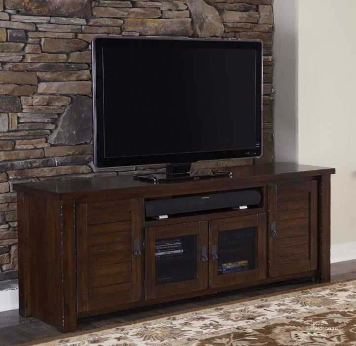 The appearance of Trestlewood Mesquite Pine 74 Console designed by Progressive Furniture in the rustic / southwestern interior design. This brown piece of furniture  was selected by 1StopBedrooms from Trestlewood Collection to add a touch of cosiness and style into your home. Sku: P611E-75. Material: Wood. Product Type: TV Console.