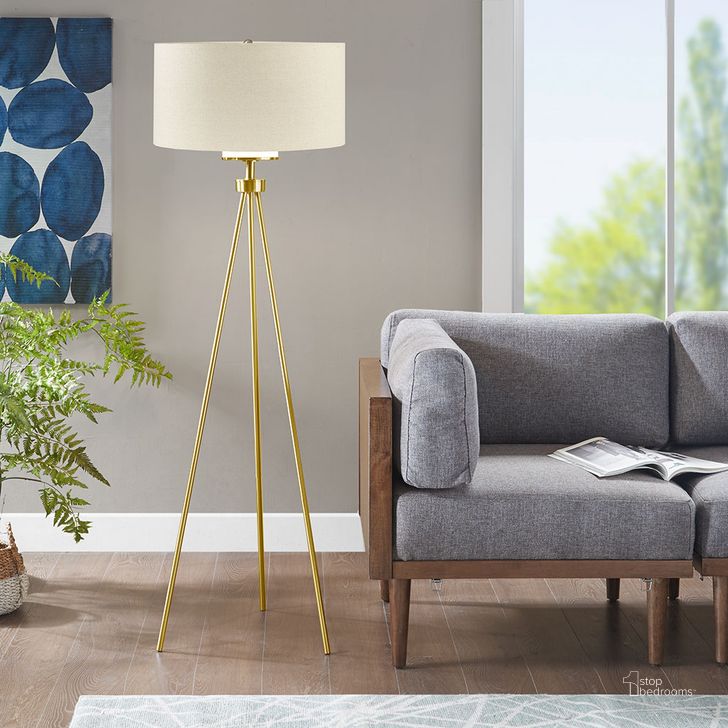 The appearance of Pacific Tripod Floor Lamp In Gold designed by Olliix in the modern / contemporary interior design. This gold piece of furniture  was selected by 1StopBedrooms from Pacific Collection to add a touch of cosiness and style into your home. Sku: FPF21-0367. Material: Polyester. Product Type: Floor Lamp. Image1