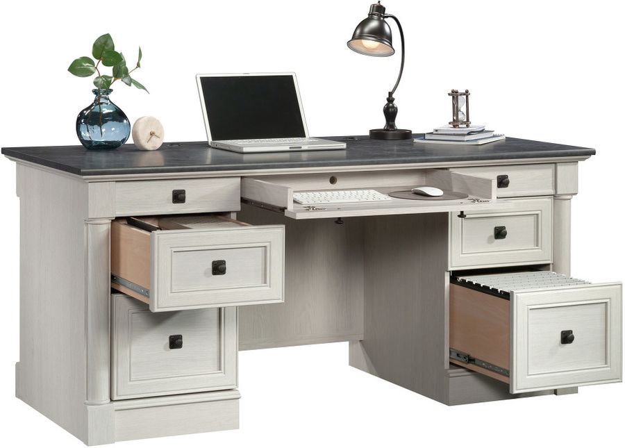 The appearance of Palladia Executive Desk In Glacier Oak designed by Sauder in the traditional interior design. This glacier oak piece of furniture  was selected by 1StopBedrooms from Palladia Collection to add a touch of cosiness and style into your home. Sku: 432726. Product Type: Executive Desk. Material: Engineered Wood. Image1