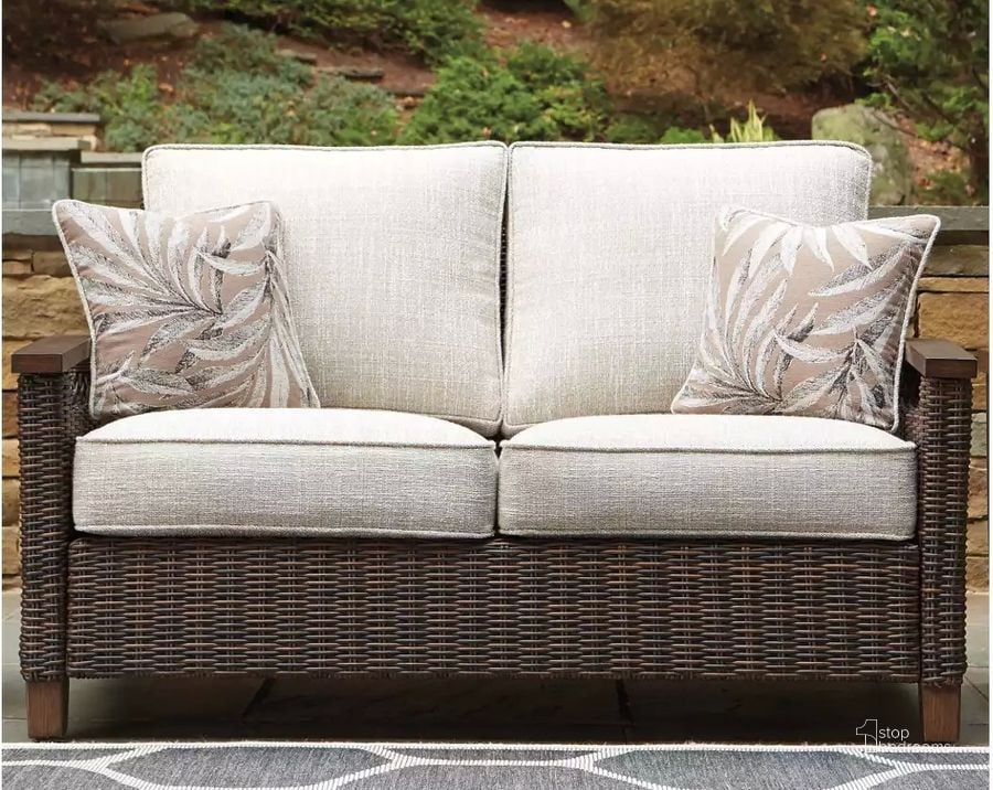The appearance of Paradise Trail Medium Brown Outdoor Loveseat with Cushion designed by Signature Design by Ashley in the modern / contemporary interior design. This medium brown piece of furniture  was selected by 1StopBedrooms from Paradise Trail Collection to add a touch of cosiness and style into your home. Sku: P750-835. Material: Fabric. Product Type: Outdoor Loveseat. Image1