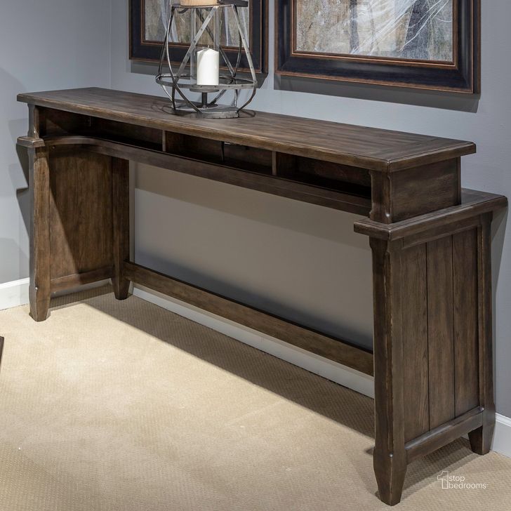 The appearance of Paradise Valley Console Bar Table In Saddle Brown designed by Liberty in the traditional interior design. This saddle brown piece of furniture  was selected by 1StopBedrooms from Paradise Valley Collection to add a touch of cosiness and style into your home. Sku: 297-OT7837. Product Type: Bar Table. Material: Rubberwood.