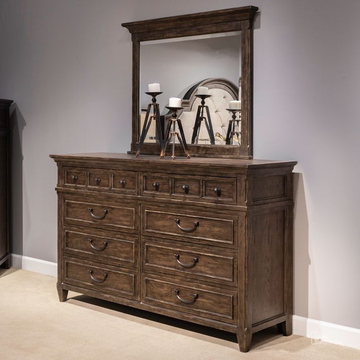 The appearance of Paradise Valley Dresser and Mirror In Saddle Brown designed by Liberty in the traditional interior design. This saddle brown piece of furniture  was selected by 1StopBedrooms from Paradise Valley Collection to add a touch of cosiness and style into your home. Sku: 297-BR31;297-BR51. Product Type: Dresser and Mirror. Material: Rubberwood.