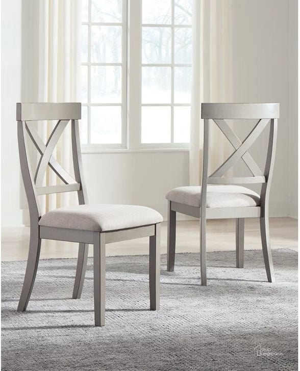 The appearance of Parellen Gray Dining Chair Set of 2 designed by Signature Design by Ashley in the transitional interior design. This gray piece of furniture  was selected by 1StopBedrooms from Parellen Collection to add a touch of cosiness and style into your home. Sku: D291-01. Material: Fabric. Product Type: Dining Chair. Image1