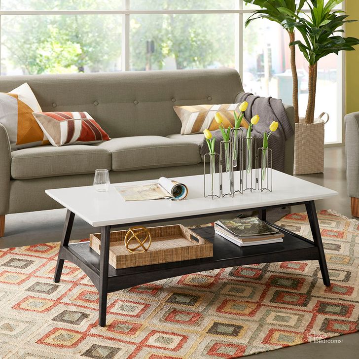 The appearance of Parker Coffee Table In Off-White/Black designed by Olliix in the modern / contemporary interior design. This off-white/black piece of furniture  was selected by 1StopBedrooms from Parker Collection to add a touch of cosiness and style into your home. Sku: MP120-1129. Product Type: Coffee Table. Material: MDF. Image1