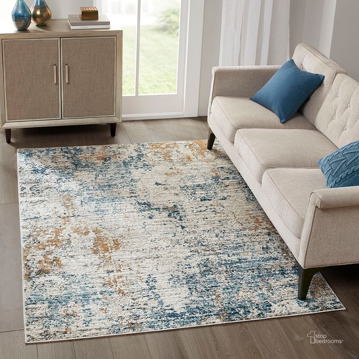 The appearance of Pegasus Abstract Area Rug In Cream/Blue MP35-7066 designed by Olliix in the traditional interior design. This cream/blue piece of furniture  was selected by 1StopBedrooms from Newport Collection to add a touch of cosiness and style into your home. Sku: MP35-7066. Material: Polyester. Product Type: Rug. Image1
