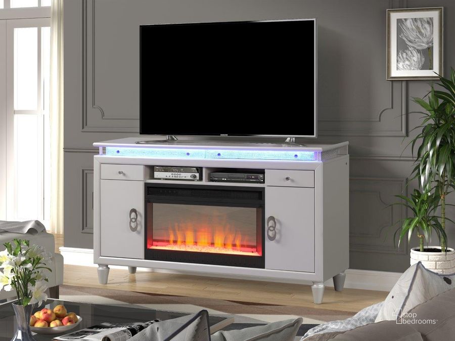 The appearance of Perla Solid Wood Tv Stand With Electric Fireplace In Milky White designed by Galaxy Home Furnishings in the modern / contemporary interior design. This milky white piece of furniture  was selected by 1StopBedrooms from Perla Collection to add a touch of cosiness and style into your home. Sku: 698781153253. Material: Wood. Product Type: TV Stand. Image1