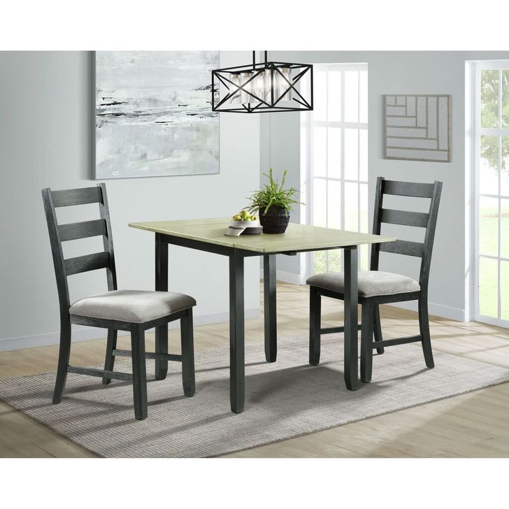 The appearance of Picket House Furnishings Tuttle 3Pc Drop Leaf Dining Set In Gray-Table and Two Chairs designed by Picket House in the transitional interior design. This grey piece of furniture  was selected by 1StopBedrooms from Tuttle Collection to add a touch of cosiness and style into your home. Sku: DMT3003DLDS. Material: Wood. Product Type: Dining Room Set. Image1