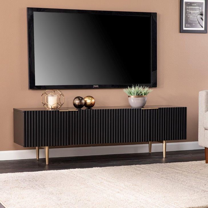 The appearance of Pilston 4-Door Media Console In Black designed by SEI Furniture in the modern / contemporary interior design. This black and gold piece of furniture  was selected by 1StopBedrooms from Pilston Collection to add a touch of cosiness and style into your home. Sku: MS1222156. Material: Wood. Product Type: Media Console. Image1