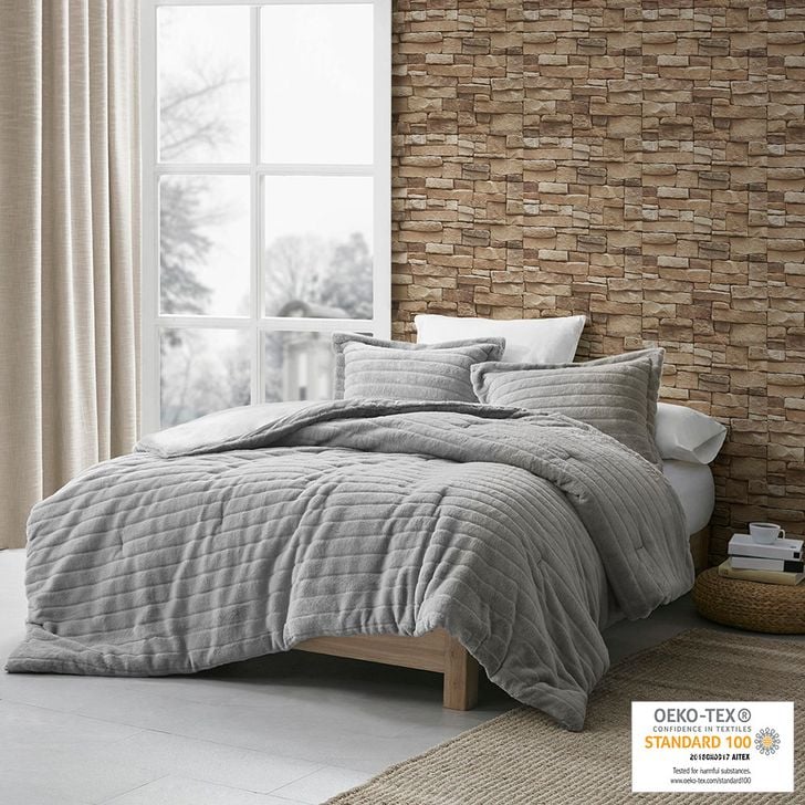 The appearance of Polyester Amara Carved Fur King Comforter Set In Grey designed by Olliix in the transitional interior design. This grey piece of furniture  was selected by 1StopBedrooms from Amara Collection to add a touch of cosiness and style into your home. Sku: MP10-7684. Material: Polyester. Bed Size: King. Product Type: Comforter Set. Image1