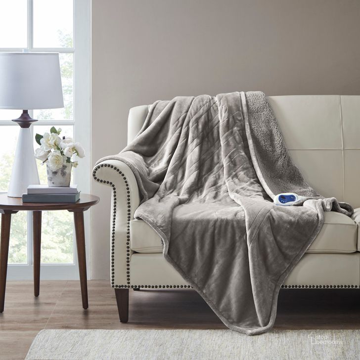 The appearance of Polyester Knitted Microlight And Berber Solid Heated Throw In Grey designed by Olliix in the transitional interior design. This grey piece of furniture  was selected by 1StopBedrooms from Heated Microlight to Berber Collection to add a touch of cosiness and style into your home. Sku: BR54-0415. Material: Polyester. Product Type: Throw. Image1