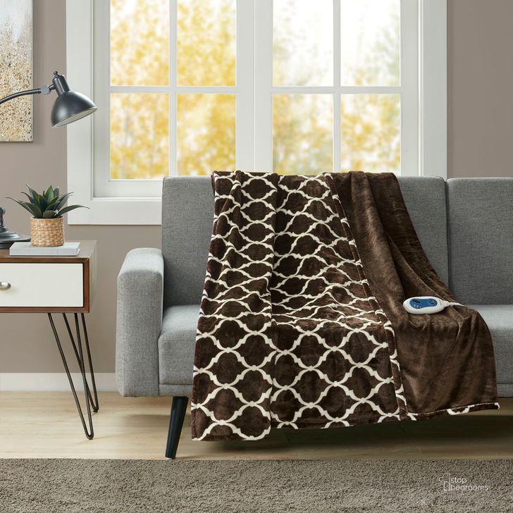 The appearance of Polyester Knitted Ogee Printed Microlight And Solid Microlight Heated Throw In Brown designed by Olliix in the transitional interior design. This brown piece of furniture  was selected by 1StopBedrooms from Heated Ogee Collection to add a touch of cosiness and style into your home. Sku: BR54-0542. Material: Polyester. Product Type: Throw. Image1